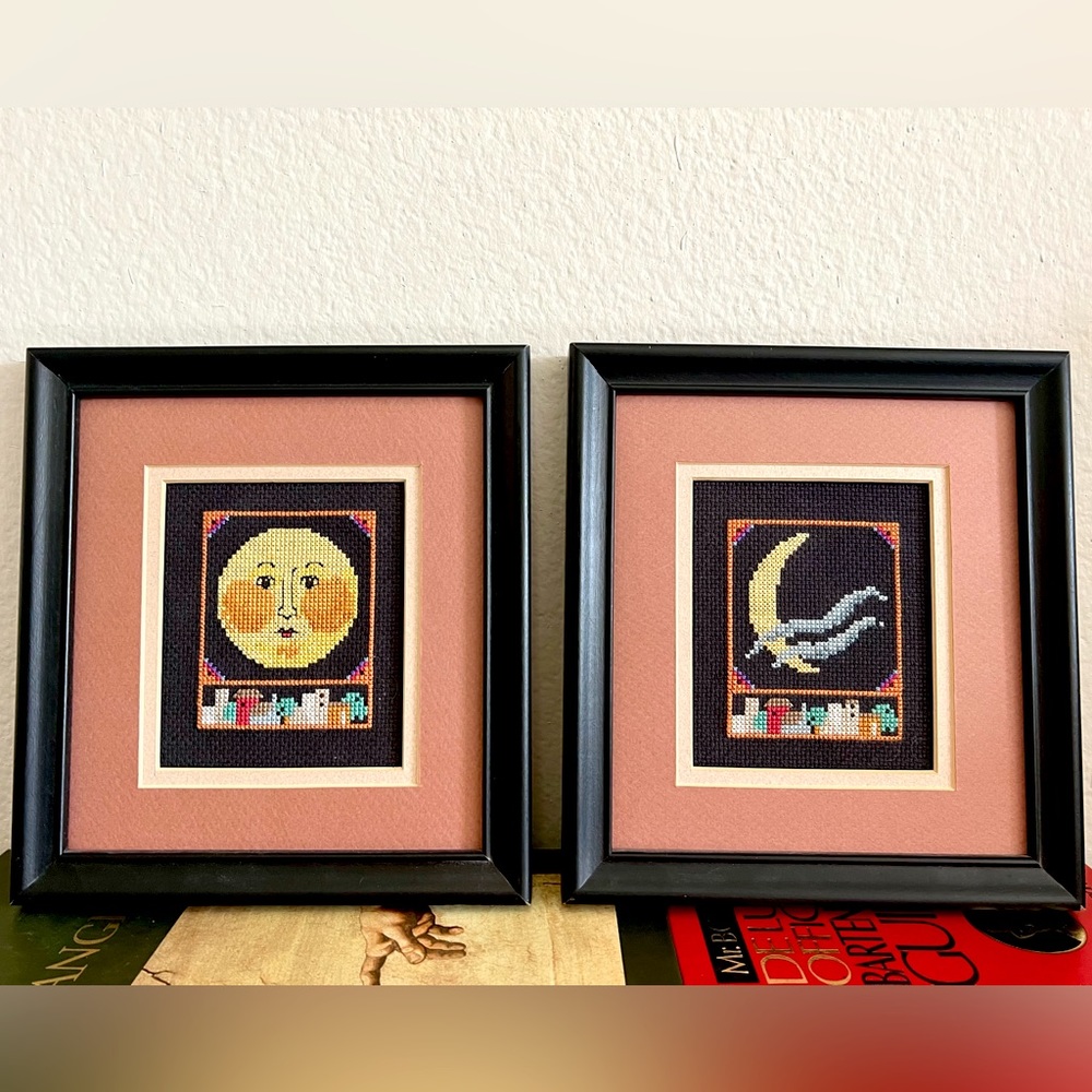 Embroidered sun and moon art work